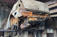 В МЧС назвали причину пожара в ярославской автомастерской