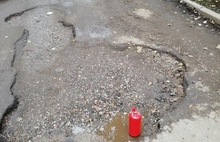 В Ярославле ямы на дорогах измеряют «огнетушителем Сашей»